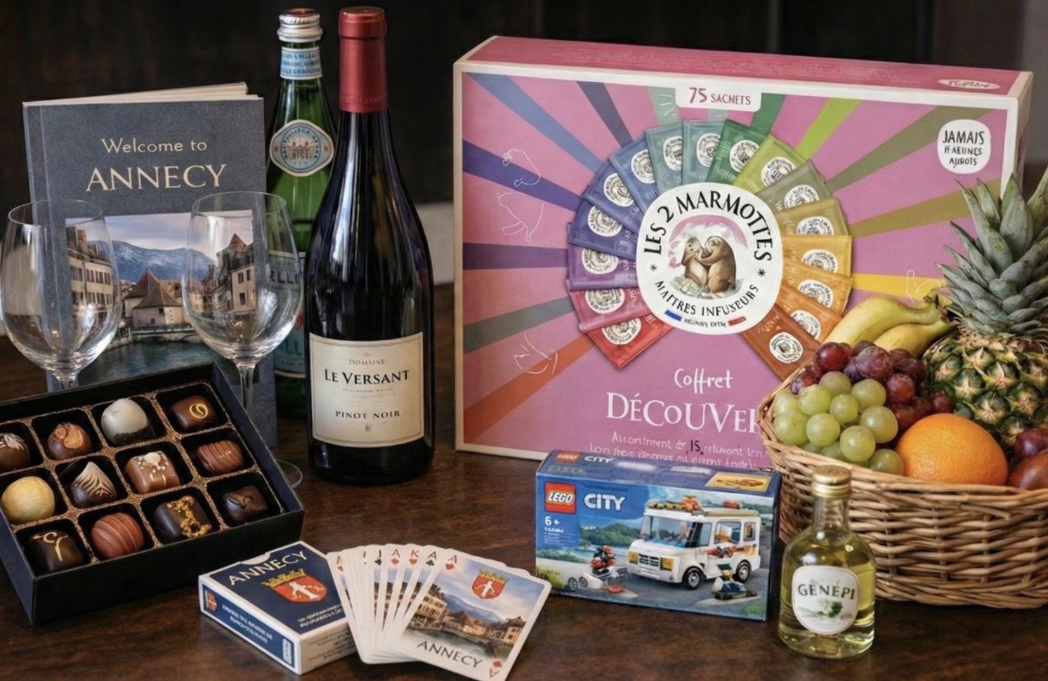 The Annecy74 welcome pack of local wine, chocolates and playing cards